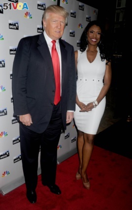 Donald Trump and Omarosa Manigault Newman at a promotional event for 'The Apprentice' in New York City.