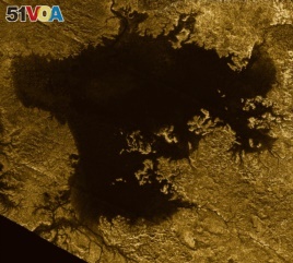 This 2007 image made available by NASA shows a hydrocarbon sea named Ligeia Mare on Saturn's moon Titan, as seen by the Cassini spacecraft.