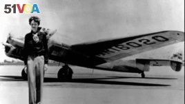 Amelia Earhart, 40, stands next to a Lockheed Electra 10E, before her last flight in 1937 from Oakland, Calif., bound for Honolulu on the first leg of her record-setting attempt to circumnavigate the world westward along the Equator. (AP Photo)