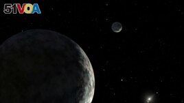 FILE - An artist's concept of the dwarf planet Eris and its moon Dysnomia is seen in this undated illustration released by NASA. The sun is the small star in the distance. (NASA/JPL-Caltech/Handout via REUTERS)