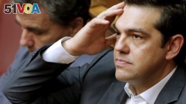 Greek Prime Minister Alexis Tsipras, right, is negotiating a tough austerity package with the European Union.