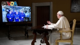 Pope Francis speaks to the crew aboard the International Space Station from the Vatican, Thursday, Oct. 26, 2017. Pope Francis' hookup Thursday marks the second papal phone call to space: Pope Benedict XVI rang the space station in 2011.(L'Osservatore Rom