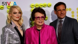 Cast members Emma Stone, left, and Steve Carell pose with former tennis player Billie Jean King at the premiere of 