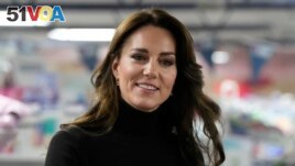 FILE - Britain's Kate, Princess of Wales smiles during her visit to Sebby's Corner in north London, Friday, Nov. 24, 2023. Princess Kate apologized Monday for 