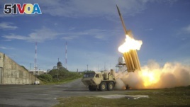 A Terminal High Altitude Area Defense (THAAD) interceptor is launched during a successful intercept test, in this undated handout photo provided by the U.S. Department of Defense.