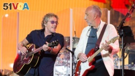 FILE - In this June 28, 2015 file photo, singer Roger Daltrey and Pete Townshed of the band The Who perform at the Glastonbury music festival at Worthy Farm, Glastonbury, England. (Photo by Jim Ross/Invision/AP, File)