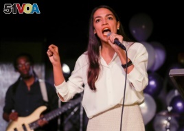 New York Democratic Congressional candidate Alexandria Ocasio-Cortez speaks to supporters, Tuesday, Nov. 6, 2018 in Queens, New York, after defeating Republican challenger Anthony Pappas in the race for the 14th Congressional district.