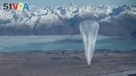 This handout photo taken on June 15, 2013 and received from Google on June 16 shows a Project Loon high altitude ballon sailing over Tekapo in Southern New Zealand.