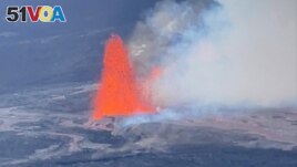 Aerial view as lava spews out during Mauna Loa's eruption in Hawaii, U.S., November 28, 2022 in this still image taken from social media video. Samantha Hansen/Safari Helicopters via REUTERS 