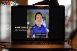In this April 26, 2020, file photo, University of Pittsburgh graduate Dallas Mavericks owner Mark Cuban congratulates members of the Class of 2020 during a virtual commencement on a computer screen in Pittsburgh.
