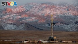 FILE - A drill rig stands at a Fervo Energy geothermal site under construction near Milford, Utah, Sunday, Nov. 26, 2023. In Nevada, Fervo's first operational project has begun sending electricity to the state's grid to power Google data centers. (AP Photo/Ellen Schmidt)