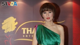 In this March 24, 2010, file photo, Thai Princess Ubolratana poses for a photo at the Thai Gala Night. (AP Photo/Kin Cheung, File)