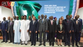 Heads of States and government pose for a photo session at the end of the closing ceremony of the African Union summit at the Palais des Congres in Niamey, on July 8, 2019. (AFP)