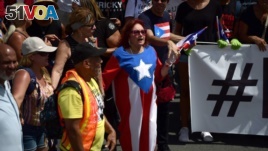 Thousands of Puerto Ricans gather for what many are expecting to be one of the biggest protests ever seen in the U.S. territory, with irate islanders pledging to drive Gov. Ricardo Rossello from office, in San Juan, Puerto Rico, July 22, 2019.