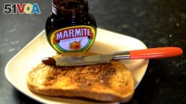 Whether you eat your toast with jam, peanut butter or Marmite, just don't burn it, say U.K. health officials. (Photo taken in Manchester, Britain in 2016 by Phil Noble for REUTERS.)