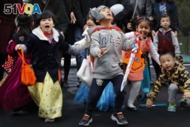 Children celebrating Halloween in China.