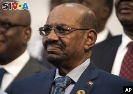 Sudanese President Omar al-Bashir is seen during the opening session of the AU summit in Johannesburg, June 14, 2015. 