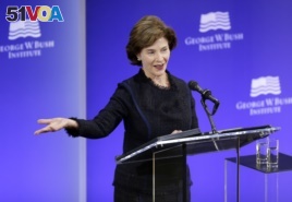 Former first lady Laura Bush speaks at a forum sponsored by the George W. Bush Institute in New York, Oct. 19, 2017.