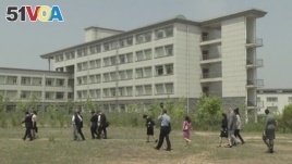 This image made from May 21, 2014, video shows a building at the Pyongyang University of Science and Technology. North Korea confirmed on Wednesday, May 3, 2017, the detention of American citizen Kim Sang Dok, who was referred to as Kim Sang-duk when Pyongyang University of Science and Technology, where he was teaching accounting, previously announced his detention. Kim's English name is Tony Kim. (AP Photo)