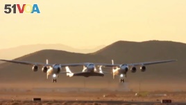 Virgin Galactic's carrier airplane WhiteKnightTwo carrying a space tourism rocket plane SpaceShipTwo takes off from Mojave Air and Space Port in Mojave, California, U.S. in a still image from video December 13, 2018.