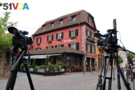 Media cameras are seen outside Le Chambard Hotel in Kaysersberg-Vignoble, where Bourdain was found dead on France, June 8, 2018.