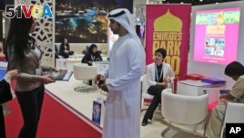An exhibitor talks to a visitor to The World Halal Travel Summit & Exhibition in Abu Dhabi, United Arab Emirates. Muslim countries in Southeast Asia hope the U.S. travel ban on people from 7 Muslim-majority countries will help them increase tourism. 