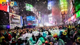 Revelers get ready to welcome the New Year in Times Square, New York, Dec. 31, 2018.