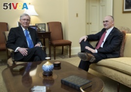 Senate Majority Leader Mitch McConnell meets Andy Puzder (right) before Puzder withdrew Wednesday as President Trump's labor secretary nominee.