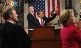 resident Barack Obama waves to First Lady Michelle Obama before 2009 speech to Congress.
