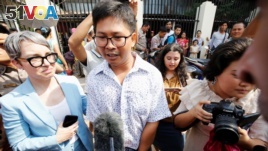 Reuters reporter Wa Lone speaks to media after he is freed from Insein prison after receiving a presidential pardon in Yangon, Myanmar, May 7, 2019.