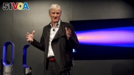 In this photo taken by AP Images for Dyson, inventor James Dyson launches the Dyson DC41 Ball vacuum and the Dyson Hot heater fan on Wednesday, Sept, 14, 2011 in New York. (Rob Bennett/AP Images for Dyson)