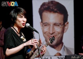 FILE - Musician Meesha Shafi performs at a tribute concert to slain journalist Daniel Pearl in Islamabad, Pakistan, Oct. 9, 2010.