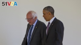 President Barack Obama walks with Democratic presidential candidate Sen. Bernie Sanders, I-Vt., down the Colonnade of the White House in Washington, June 9, 2016.