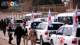 International Committee of the Red Cross (ICRC) convoy seen crossing into eastern Ghouta near Wafideen camp in Damascus, March 5, 2018. 