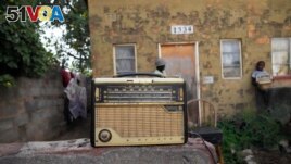 An old radio is placed outside Ngwiza Khumbulani Moyo's home in Bulawayo on February 15, 2023. (AP Photo/Tsvangirayi Mukwazhi)