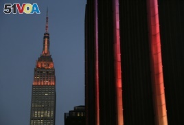 Orange lighting illuminates the Empire State Building in recognition of Gun Violence Awareness Month, Wednesday, June 1, 2016, in New York.
