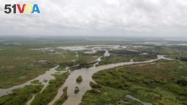 This May 1, 2019, photo shows the Davis Pond Diversion in St. Charles Parish, Louisiana. (AP Photo/Gerald Herbert)