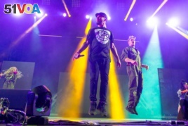 Walshy Fire, left, and Diplo of Major Lazer perform during the Life is Beautiful festival on September 25, 2015 in Las Vegas.