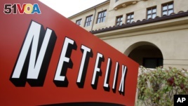 FILE - A sign points to Netfilx headquarters in Los Gatos, Calif. Netflix.