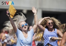 Sorority girls run after in excitement after receiving their sorority's bid for recruitment during the University of Alabama Bid Day, Saturday, August 19, 2017, in Tuscaloosa, Alabama.