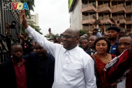 Felix Tshisekedi, leader of the Congolese main opposition party, the Union for Democracy and Social Progress (UDPS) who was announced as the winner of the presidential elections gestures to his supporters in Kinshasa, Democratic Republic of Congo, Jan. 10