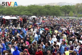 FILE: A crowd gathers for the March for Science in Washington, Saturday, April 22, 2017. Thousands of scientists worldwide left their labs to take to the streets to support science research and funding.