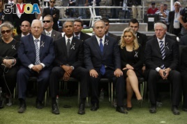 Barack Obama, Israeli Prime Minister Benjamin Netanyahu sit during the funeral of former Israeli President Shimon Peres.
