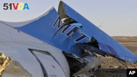 This photo shows the tail of a Metrojet plane that crashed in Hassana, Egypt on Saturday, Oct. 31, 2015. 