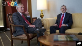 Judge Merrick Garland, right, President Barack Obama's choice to replace the late Justice Antonin Scalia on the Supreme Court, meets with Sen. Angus King, an independent from Maine, on Capitol Hill in Washington, April 13, 2016.  