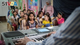 This group is one of five that meets with Selim Sahab and will eventually make up a choir of 300 underprivileged children, Tripoli, Lebanon, Oct. 28, 2017. Sahab began by auditioning about 2,000 children.