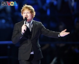 FILE - British singer Ed Sheeran at the MTV European Music Awards in Milan, Italy.