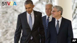Federal appeals court judge Merrick Garland, walks out with President Barack Obama and Vice President Joe Biden as he is introduced as Obama's nominee for the Supreme Court during an announcement in the Rose Garden of the White House, in Washington, Wednesday, March 16, 2016. (AP Photo/Andrew Harnik)