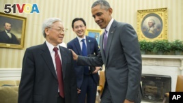 President Barack Obama, right, meets with Vietnamese Communist party secretary general Nguyen Phu Trong in the Oval Office of the White House, on Tuesday, July 7, 2015. (AP Photo/Evan Vucci)