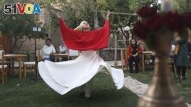 Fahima Mirzaie performs a Sema dance (Sufi Whirling) in Kabul Afghanistan, Thursday, Aug. 20, 2020. (AP Photo/Mariam Zuhaib)